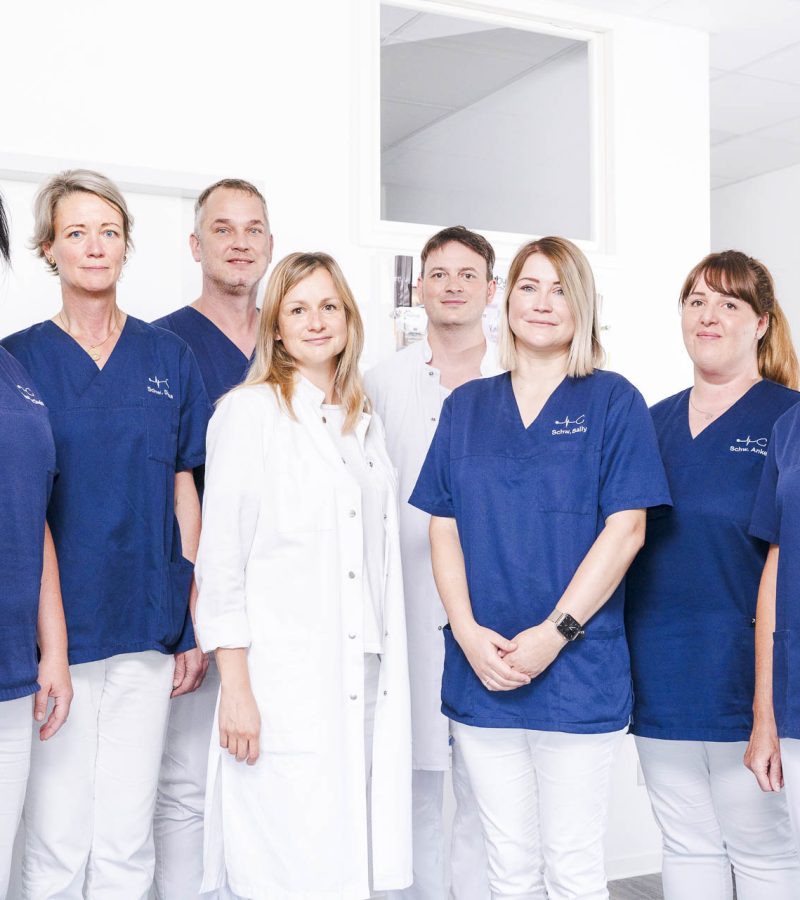 Gruppenbild eines Praxisteams beim Business Arztpraxisshooting